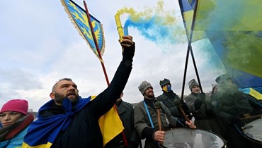 متظاهرون في كييف (أ ف ب).