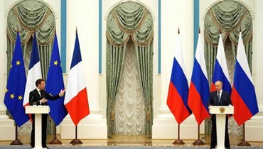الرئيسان الفرنسي والروسي في مؤتمر صحافي (أ ف ب).