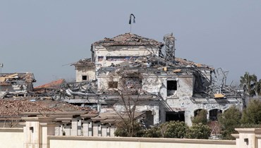 منظر لمبنى مدمّر بعد الهجوم في أربيل شمال العراق (13 آذار 2022 - أ ف ب).