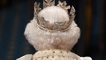 الملكة إليزابيث الثانية خلال الافتتاح الرسمي للبرلمان في مجلسي البرلمان في لندن (14 تشرين الأول 2019 - أ ف ب)..