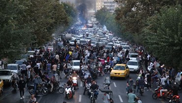 من الاحتجاجات في إيران (أ ف ب).