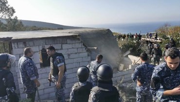 إزلة مخالفات بناء  في بلدة المنصوري. 