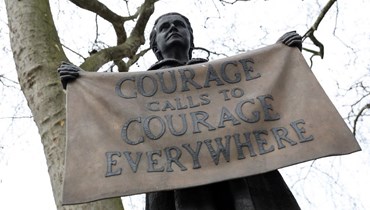 تمثال للناشطة الاجتماعية ميليسنت فوسيت في ساحة البرلمان في وسط لندن (أ ف ب). 