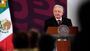 لوبيز أوبرادور متكلما خلال مؤتمر صحافي في القصر الوطني في مكسيكو سيتي (29 ك2 2024، أ ف ب).