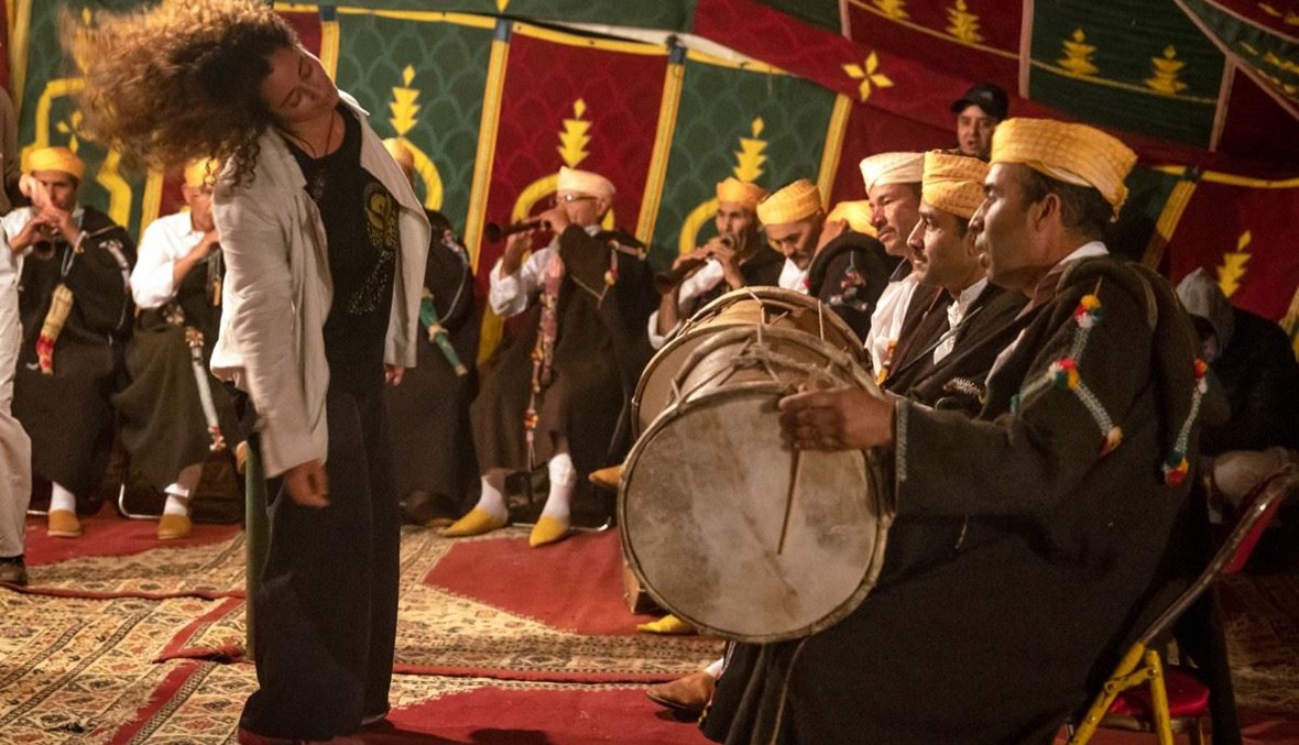 كبار موسيقيي جهجوكة يؤدون خلال مهرجان جهجوكة الموسيقي السنوي في قرية جهجوكة بشمال المغرب (27 ايار 2024، أ ف ب).