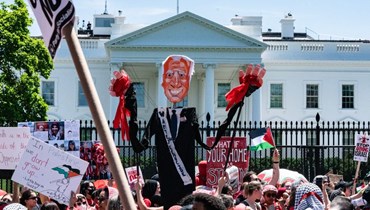 بالصور- تظاهرة لآلاف المؤيدين لغزّة ضدّ بايدن في واشنطن: "نحن الخطّ الأحمر"