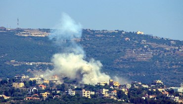 دخان يتصاعد بعد القصف الإسرائيلي على قرية شيحين في جنوب لبنان (أ ف ب). 