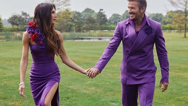 فيكتوريا وديفيد بيكهام يعيدان إحياء ملابس زفافهما الأرجوانية (صور)